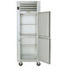 A white Traulsen hot food holding cabinet with two doors open.