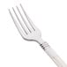 A WNA Comet Reflections Duet stainless steel look plastic fork with an ivory handle.