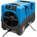 A blue and grey Dri-Eaz Revolution LGR dehumidifier with a fan.