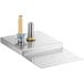A Micro Matic undercounter mount glass rinser metal plate with brass fittings.