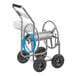 A Lavex garden hose reel cart with a hose in a basket.