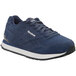 A navy blue Reebok Harman women's athletic shoe with a white sole and white Reebok text.