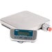 An Edlund stainless steel digital pizza scale with a digital display on the front.