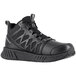 A Reebok Work black mid-high athletic shoe with composite toe and non-slip sole.