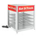 A ServIt countertop hot food display warmer with 4 shelves and a red sign.