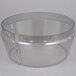 A clear plastic bowl with a clear plastic lid with a hole in the middle.