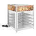 A ServIt countertop display warmer with roasted nuts on shelves.