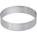 A silver stainless steel circular tart ring with perforations.