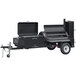 A black Meadow Creek barbecue trailer with a lid open.