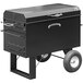 A black rectangular metal barbecue pit with wheels.
