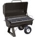 A black Meadow Creek 42" Gas Pig Roaster with wheels and a metal grate.