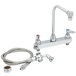 A T&S deck-mount faucet with a 48" hose and sprayer.