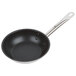 A close-up of a black Vollrath Optio frying pan with a handle.