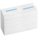A stack of white paper towels with blue stripes.