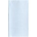 A light blue Tork paper towel with a white border.