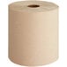 A roll of Tork natural Kraft paper towels.