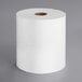A white roll of Tork Universal 1-ply paper towels.