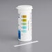 A white container with a white lid and a white strip of Hydrion Chlorine Test Strips.