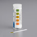 A test tube vial containing Hydrion wine pH test strips.