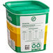 A green and yellow container of Knorr Professional Select Chicken Base with a label.