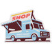 A white die-cut vinyl sticker of a blue food truck with the word "shop" on the side.