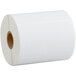 A roll of white paper with white Lavex labels on it.