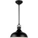 A black Canarm Sussex LED pendant light with a white shade over a dining table in a restaurant.