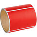 A red roll of Lavex thermal labels.