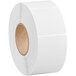 A roll of white Lavex thermal transfer labels with a brown edge.