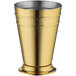 A gold cup with a silver rim.