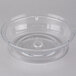 A clear plastic bowl with a ring on top.