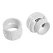 Two white plastic fittings with a white cap and a white plastic pipe fitting.