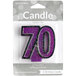 A package containing a purple glitter "70" candle with black and purple glitter.