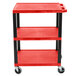 A red Luxor utility cart with three shelves and black legs.