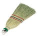 A close-up of a Heavy-Duty Authentic Amish-Made Corn Whisk Broom with a green handle and red and blue stripes.