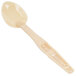 A beige plastic spoon with a handle.