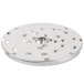 A Robot Coupe 9/32" grating/shredding disc, a circular metal object with holes.