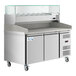 An Avantco stainless steel refrigerated pizza prep table with glass doors.