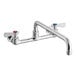 A chrome Regency wall mount faucet with red and blue knobs.