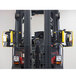 A black forklift with GenieGrips Wideview mirrors on the side.