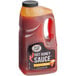 A plastic jug of Sauce Craft Hot Honey Sauce.