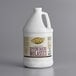 A white jug with a handle labeled "Golden Barrel 1 Gallon Sulfur-Free Supreme Baking Molasses"