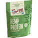 A green bag of Bob's Red Mill Organic Hemp Protein Powder with white text and green leaves.