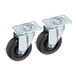 A pair of Avantco casters with black rubber wheels and metal swivel.