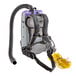 A ProTeam Super Coach backpack vacuum with straps and a tube.