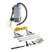 A ProTeam Super Coach Pro backpack vacuum cleaner with tools and accessories.
