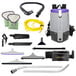 A ProTeam backpack vacuum with various tools.