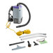A ProTeam backpack vacuum cleaner with hose and accessories.