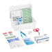 A First Aid Only first aid kit with scissors and several other items on a white background.