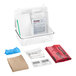A white plastic container with a First Aid Only Bloodborne Pathogen Spill Clean-Up Kit inside.